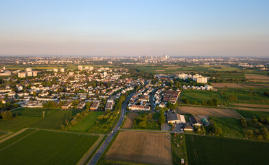 Fototapeta na wymiar Aerial drone view of the Taunus with Frankfurt in the background during sunset