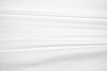 Obraz premium Textures Background Abstract white fabric background pattern with soft waves is suitable for a dress or suit where transparency and flow are required.