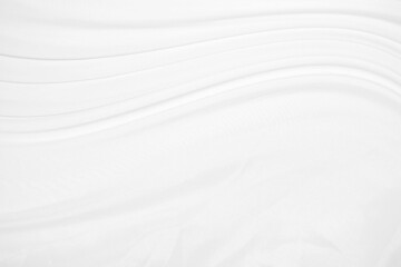 Textures Background Abstract white fabric background pattern with soft waves is suitable for a dress or suit where transparency and flow are required.