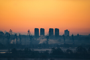 sunrise/sunset over the city. Industrial view