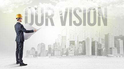 Fototapeta premium Young businessman with hard hat