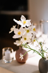 Obraz na płótnie Canvas Dinner table decorated by candles and flowers. Wedding. Decor