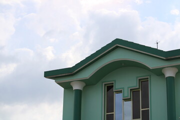 old house with clouds