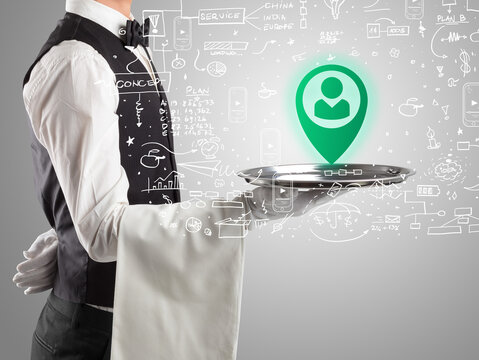 Close-up of waiter serving social media icons