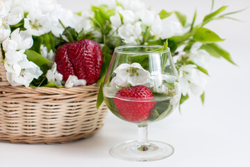 Red strawberries in a glass. Harvesting berries