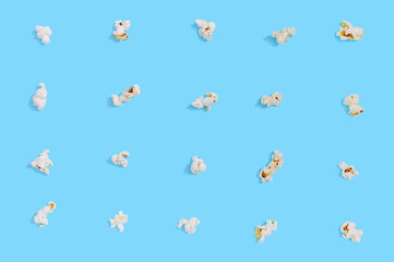 Popcorn seamless pattern on blue background. Top view