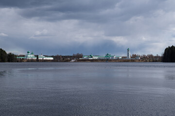 View of the Roshchinsky Lake and the Trinity Alexander-Svirsky Monastery. Village Staraya Sloboda,...