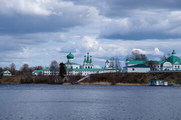 View of the Roshchinsky Lake and the Trinity Alexander-Svirsky Monastery. Village Staraya Sloboda,...