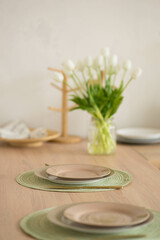 two plates stand on a table on a stand
