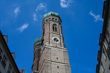 Fototapeta na wymiar Munich, Germany: Towers of the Frauenkirche church. München, capital of the German state of Bavaria. Symbol of Munich.