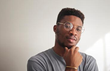 portrait of a young man with glasses