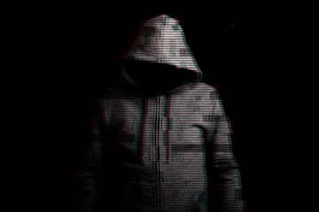 Man without a face in a hood on a dark background. Added glitch effect