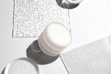 mockup of perfume skin care bottle cosmetic tube of beauty makeup facial, treatment cleanser face foam, beauty healthcare branding packaging in water splash