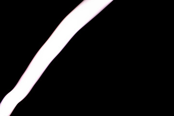 A streak of white light on a dark background