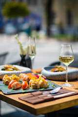 sushi and white wine outdoor