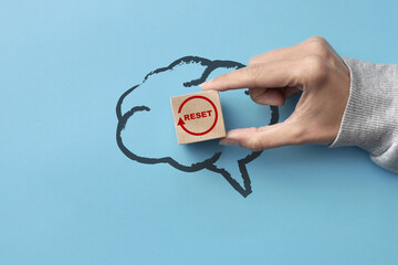 The silhouette of the brain and the inscription: reset in it. - obrazy, fototapety, plakaty