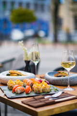 sushi and white wine outdoor
