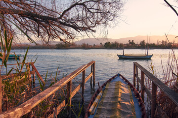 River views during sunset and boats sailing