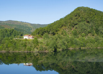 Fototapeta na wymiar A?arbe forests and reservoir in springtime, between Gipuzkoa and Navarre
