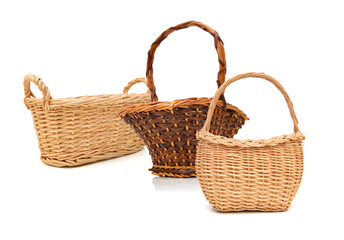 Fototapeta na wymiar Empty wooden fruit or bread baskets on white background 