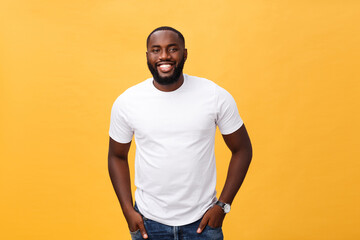 Portrait of delighted African American male with positive smile, white perfect teeth, looks happily at camera, being successful enterpreneur, wears white t shirt. - Powered by Adobe