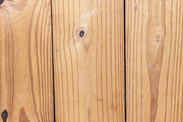 Natural wood texture on vertical slats with scratches and scratches, signs of use, rustic