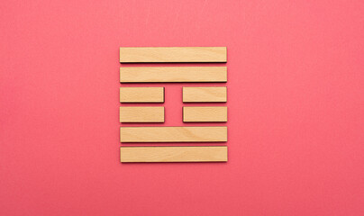 Gene Key 61 wood hexagram i ching on pink background