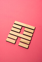 Gene Key 52 wood hexagram i ching on pink background
