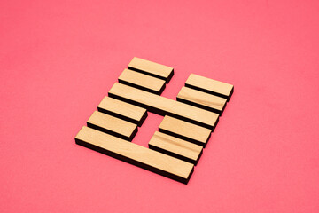 Gene Key 51 wood hexagram i ching on pink background