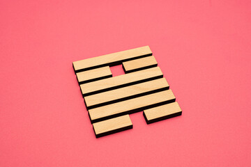 Gene Key 50 wood hexagram i ching on pink background