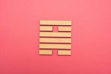 Naklejka na ściany i meble Gene Key 50 wood hexagram i ching on pink background