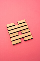 Gene Key 47 wood hexagram i ching on pink background