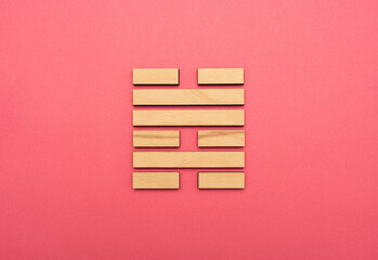Gene Key 47 wood hexagram i ching on pink background
