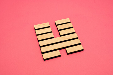 Gene Key 46 wood hexagram i ching on pink background
