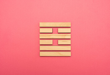 Gene Key 38 wood hexagram i ching on pink background