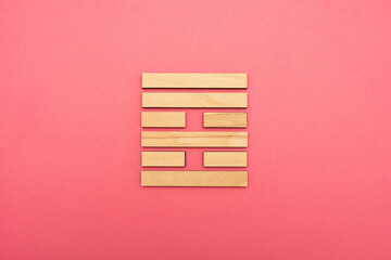 Gene Key 37 wood hexagram i ching on pink background