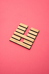 Gene Key 36 wood hexagram i ching on pink background