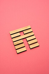 Gene Key 35 wood hexagram i ching on pink background