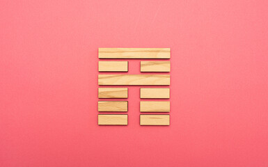 Gene Key 35 wood hexagram i ching on pink background