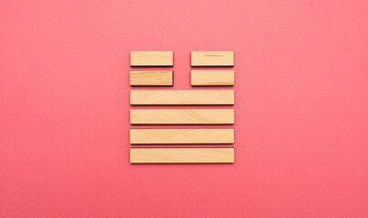 Gene Key 34 Hexagram wood i ching on pink background