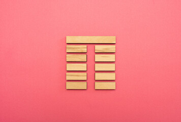 Gene Key 23 Hexagram wood i ching on pink background