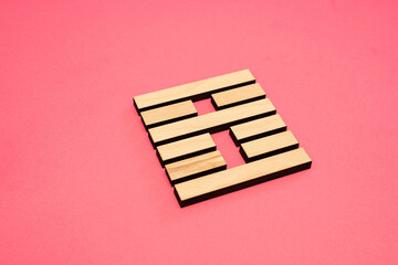 Gene Key 21 Hexagram wood i ching on pink background