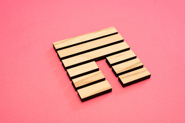 Gene Key 12 Hexagram wood i ching on pink background