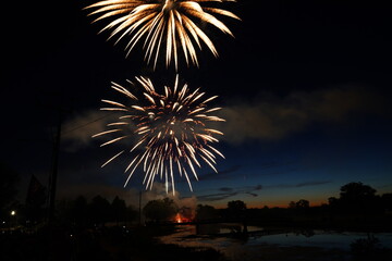 Fototapeta na wymiar Firework show in New Lisbon, Wisconsin during Wa Du Shuda Days festival.