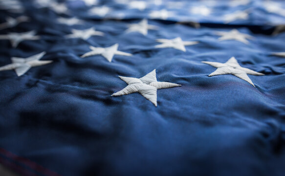 background. American flag in national colors. blur, out of focus.