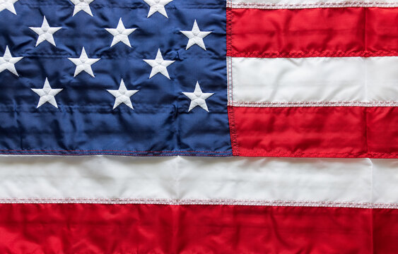 background. American flag in national colors. blur, out of focus.