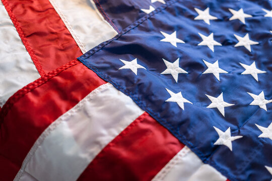 background. American flag in national colors. blur, out of focus.