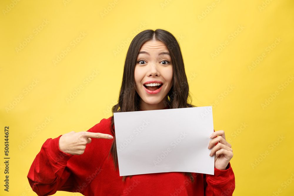 Wall mural girl holds a white sheet in hands, an office worker shows a blank sheet.