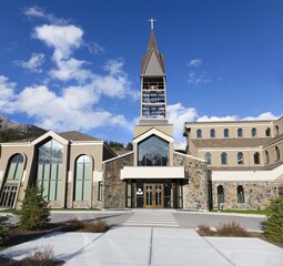 The Shrine Church of Our Lady of The Rockies.  Modern Roman Catholic Church Building Exterior in City of Canmore, Alberta Canadian Rocky Mountains