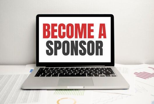 become a sponsor word on the laptop display. concept